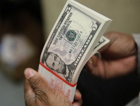 Dollar slips lower on rate cut expectations; euro nears  this year’s high