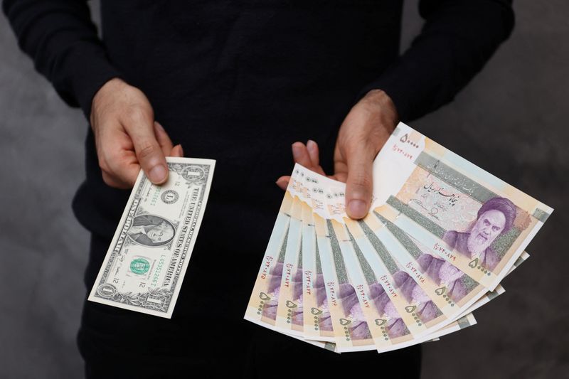 Iran currency slips to new lows amid U.S., Europe tensions