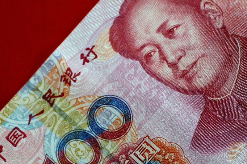 China’s yuan slides to 4-month low on tariff threats and mixed PMI data